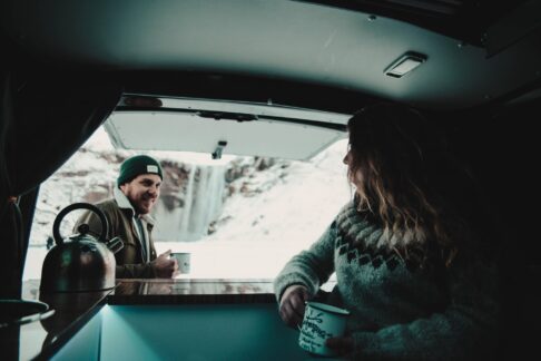 people inside a camper in winter