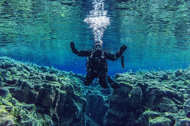 You can dive between continent in Iceland