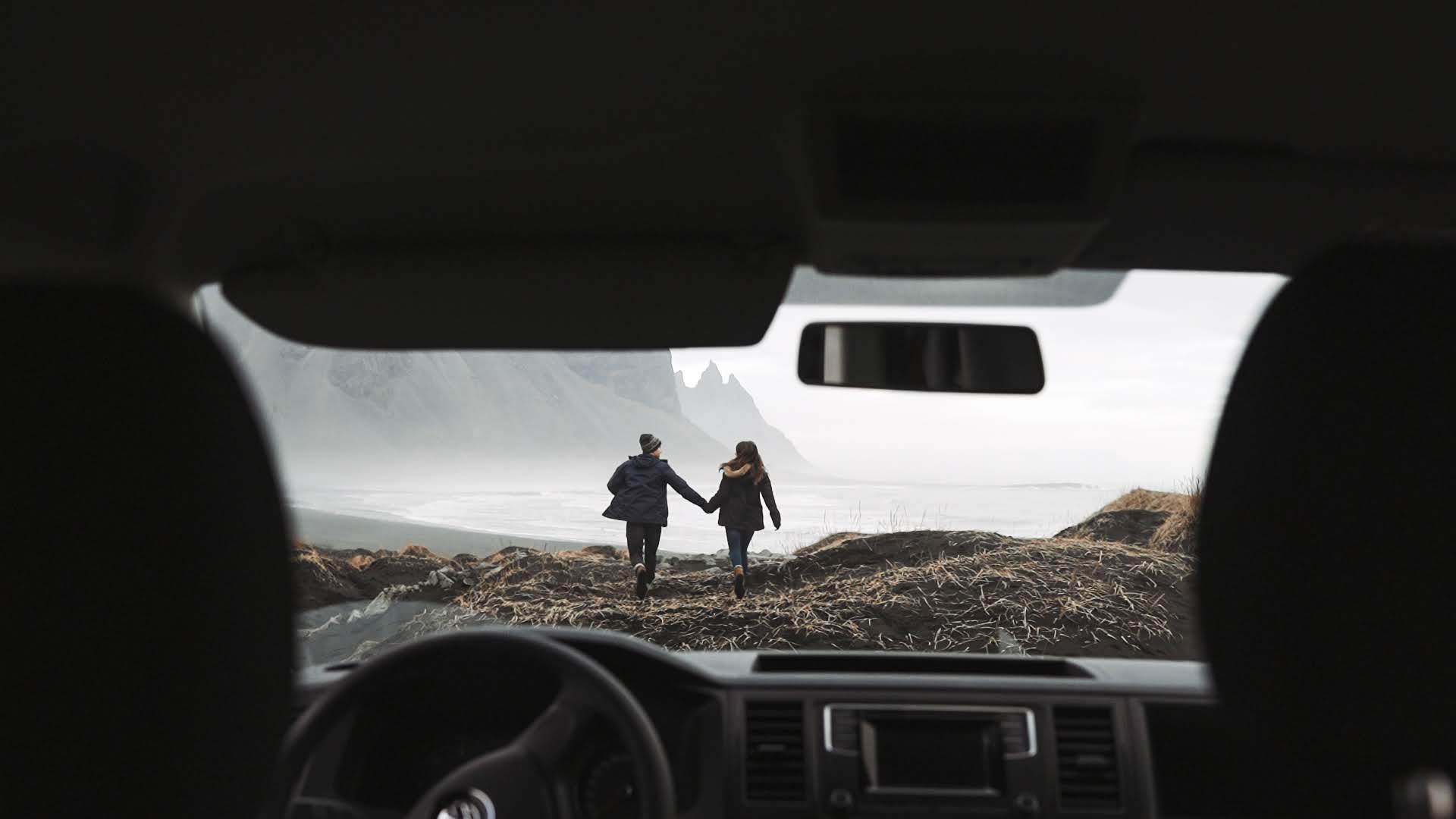 Aerial Footage of a Cozy Camper as it travels the roads of Iceland