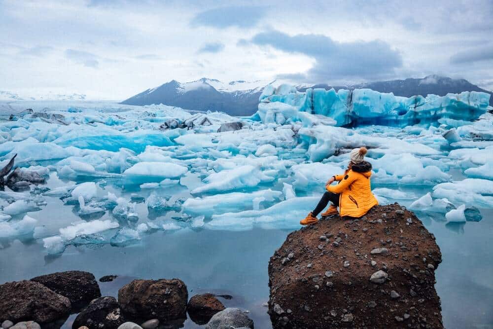 A visitor views Jökulsárlón lake in the winter.