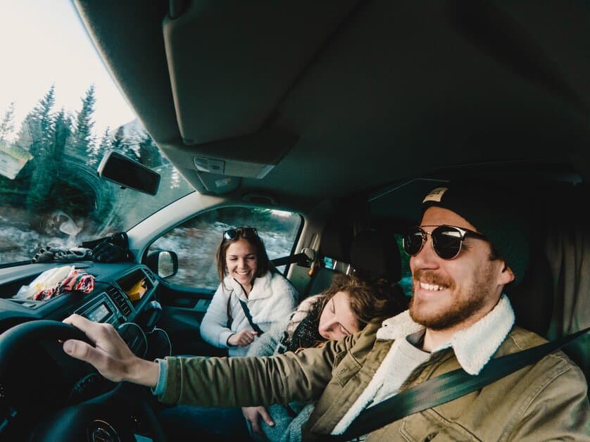 Three friends driving through Iceland taking full advantage of the camper van.